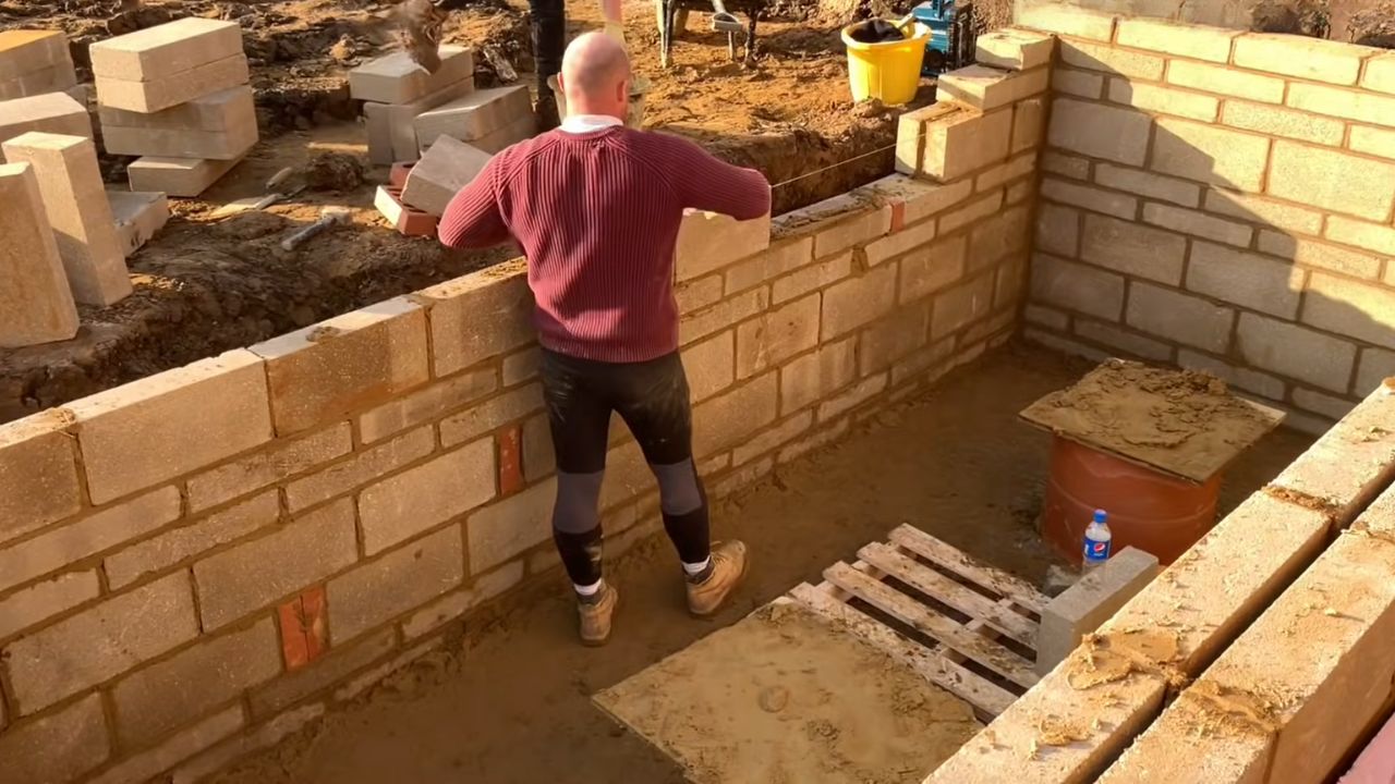 Construction of swimming pool with bricks